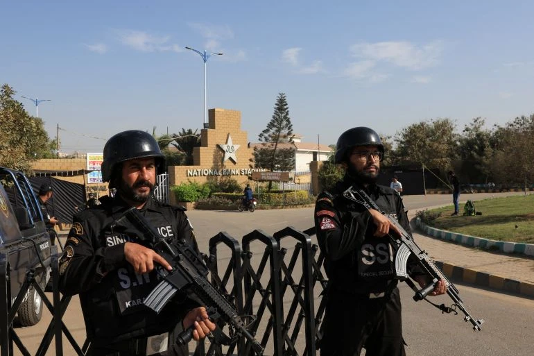 Members of the Special Security Unit (SSU) stand guard outside National Bank Stadium ahead of the ICC Champions Trophy 2025 tournament in Karachi, Pakistan February 14, 2025. REUTERS/Akhtar Soomro