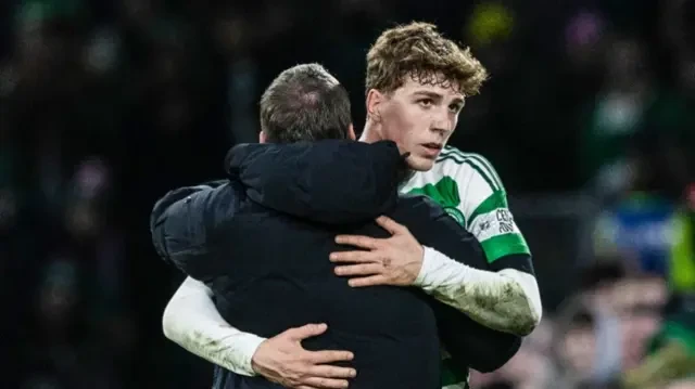 Celtic manager Brendan Rodgers (L) with Arne Engels during a William Hill Premiership match between Celtic and Aberdeen at Celtic Park, on February 25, 2025, in Glasgow, Scotland.