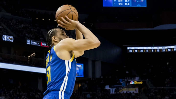 Feb 23, 2025; San Francisco, California, USA; Golden State Warriors forward Kevin Knox II (31) takes a three-point shot against the Dallas Mavericks during the fourth quarter at Chase Center. Mandatory Credit: John Hefti-Imagn Images