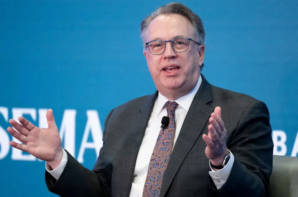 John Williams, president and CEO of the Federal Reserve Bank of New York, warns of tariff-induced inflation, as captured by SAUL LOEB via Getty Images.