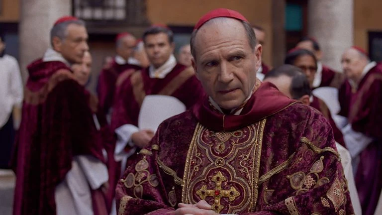 Ralph Fiennes stars as Cardinal Lawrence in director Edward Berger's Conclave. Pic: Focus Features 2024