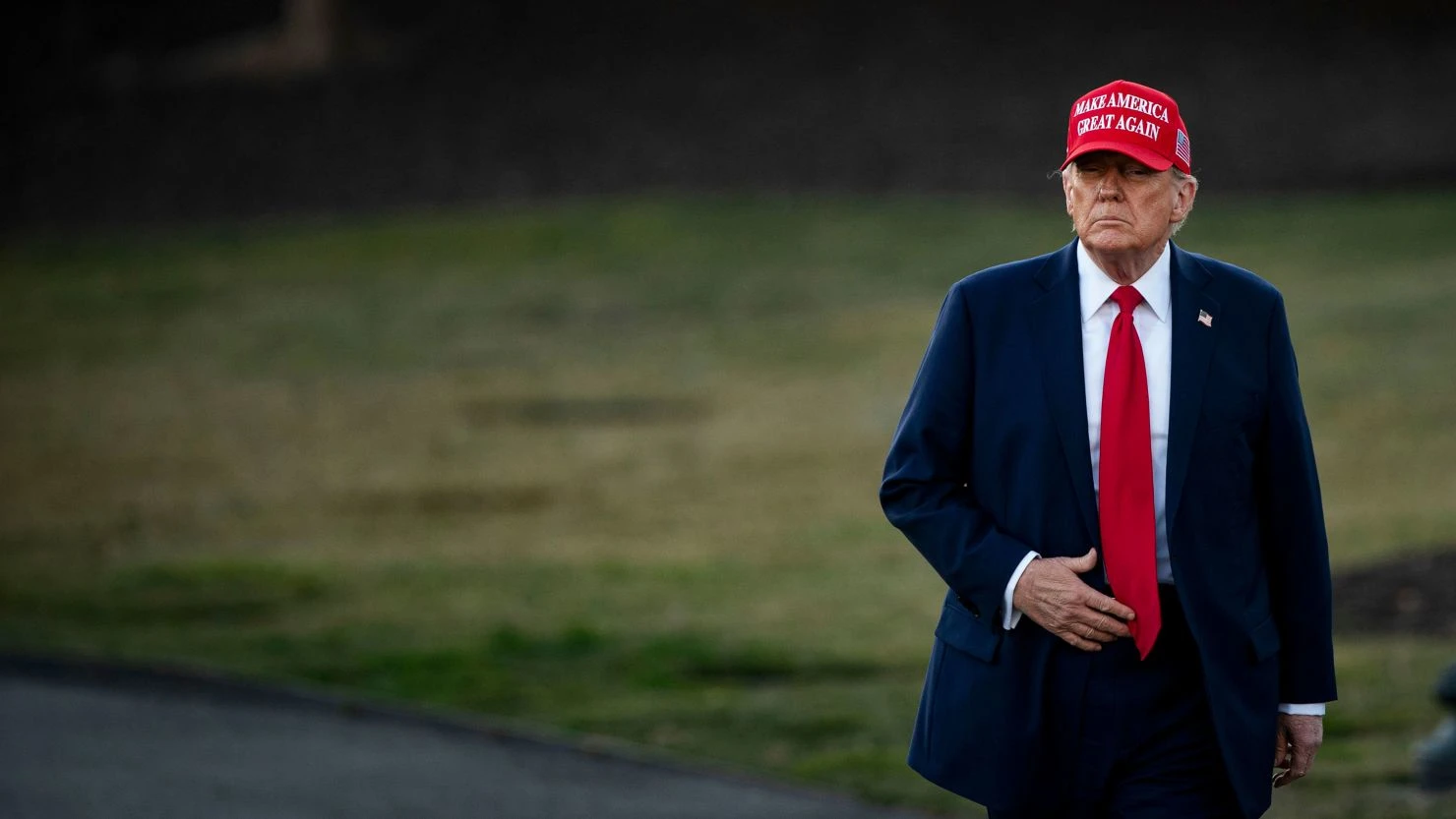 US President Donald Trump walks to speak to members of the media on the South Lawn of the White House before boarding Marine One in Washington, DC, US, on Friday, Feb. 28, 2025.