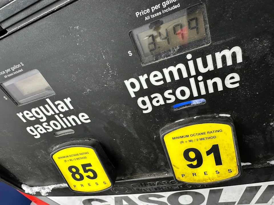 A digital display shows the price per gallon at a Costco gasoline station in Sheridan, Colorado, a sight that will become all too familiar as gas prices rise in the coming weeks, courtesy of the Trump administration's tariffs on Canadian crude products, as captured by AP Photo/David Zalubowski for the Associated Press.