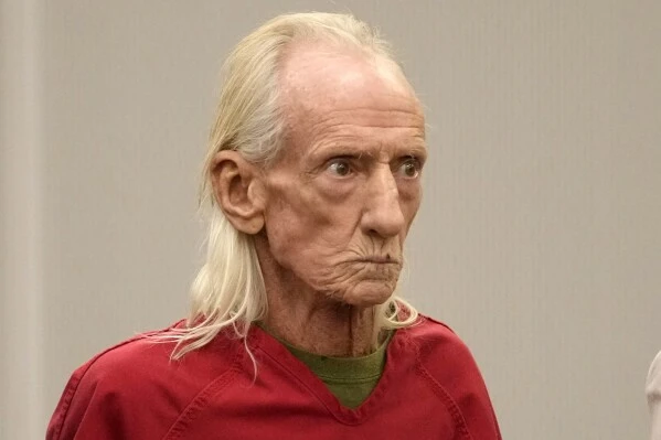 Joseph Czuba, 71, stands before Circuit Judge Dave Carlson for his arraignment at the Will County, Ill., courthouse, Oct. 30, 2023, in Joliet, Ill. (AP Photo/Charles Rex Arbogast, File)