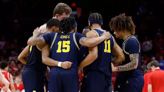 Men's Basketball Group Huddle