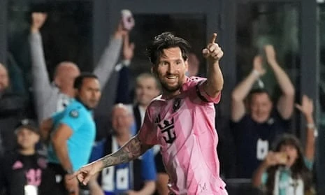 Inter Miami forward Lionel Messi (10) celebrates scoring his side's first goal against Sporting Kansas City on Tuesday