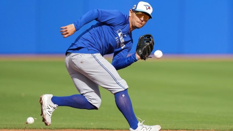 Toronto Blue Jays second baseman Andrés Giménez fields a ground ball during spring training in Dunedin Fla., on Tuesday, February 18, 2025. (Nathan Denette/THE CANADIAN PRESS)