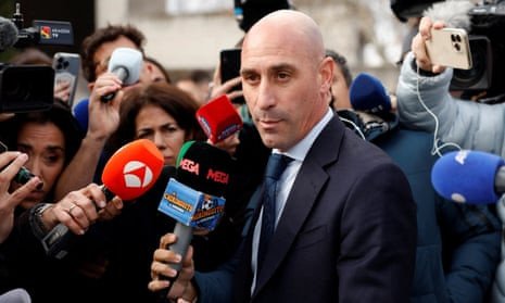 Luis Rubiales surrounded by journalists