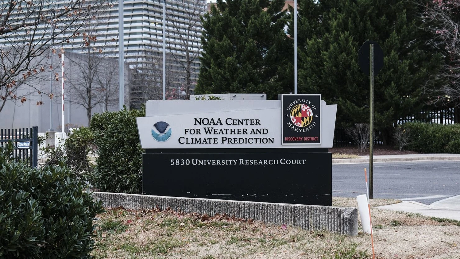 Signage outside the National Oceanic and Atmospheric Administration (NOAA) Center for Weather and Climate Prediction headquarters in College Park, Maryland, on Thursday, December 5, 2024.