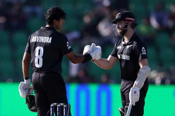 Rachin Ravindra celebrates his century, photo by Getty Images, highlighting New Zealand's strong batting performance in the ICC Champions Trophy