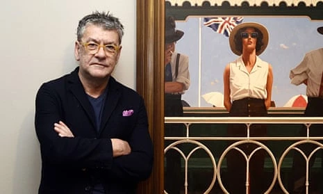 Jack Vettriano poses alongside a painting