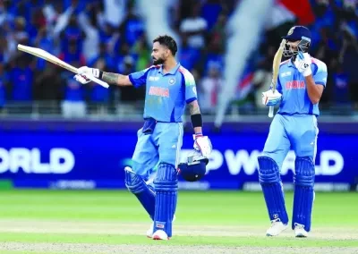 India’s Virat Kohli celebrates after completing his century and winning the Champions Trophy match against Pakistan in Dubai yesterday.