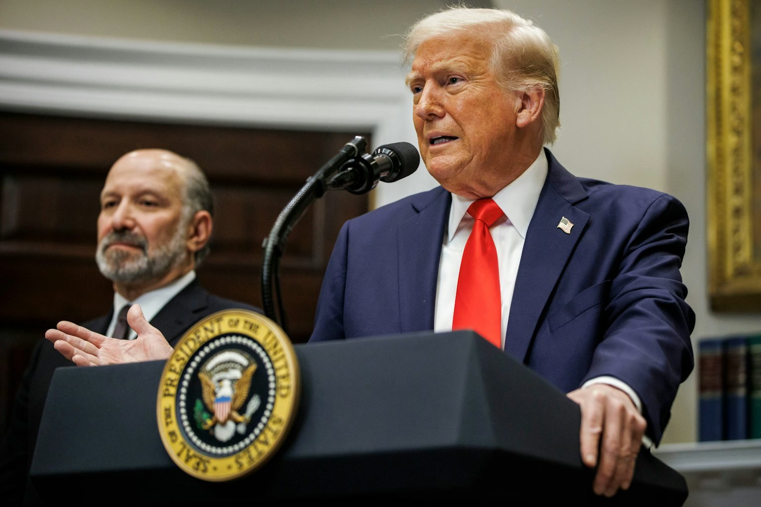 Photo by Getty Images: Morning brief image - Stock market screens display plummeting numbers as investors react to Trump's retaliatory tariffs and economic actions.