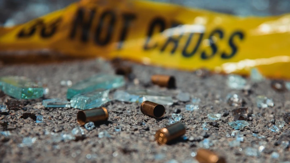 File: Bullet casings and broken glass at a crime scene. GettyImages/D-Keine