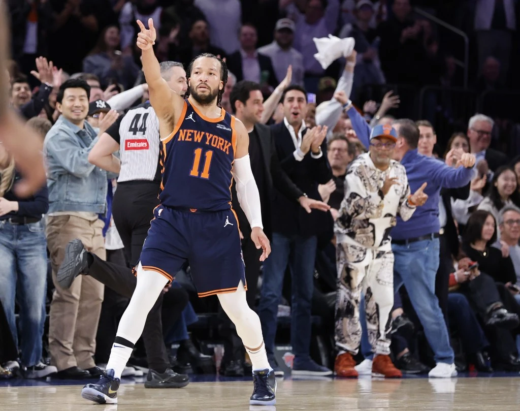 Jalen Brunson, who scored a game-high 34 points, celebrates after hitting a 3-pointer late in the fourth quarter of the Knicks' 110-105 win over the 76ers on Feb. 26, 2025.