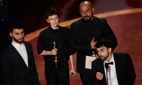 97th Academy Awards - Oscars Show - Hollywood<br>Basel Adra, Rachel Szor, Hamdan Ballal and Yuval Abraham win the Oscar for Best Documentary Feature Film for "No Other Land" during the Oscars show at the 97th Academy Awards in Hollywood, Los Angeles, California, U.S., March 2, 2025. REUTERS/Carlos Barria