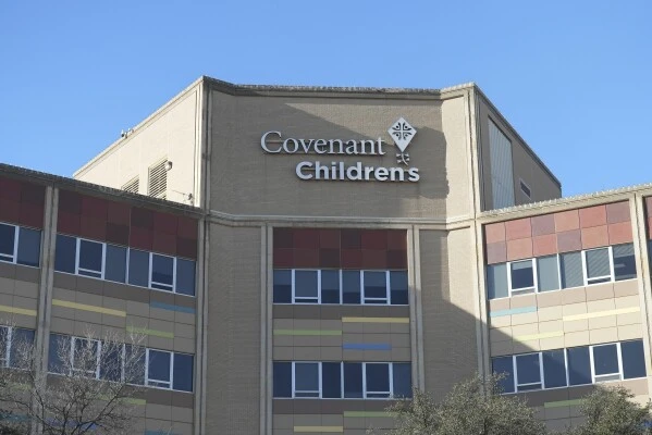 Covenant Children's Hospital is pictured from outside the emergency entrance on Wednesday, Feb. 26, 2025, in Lubbock, Texas. (AP Photo/Mary Conlon)