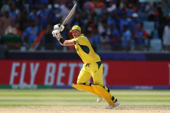 Steven Smith en route to his half-century, setting the tone for Australia's competitive total, photo by Getty Images.