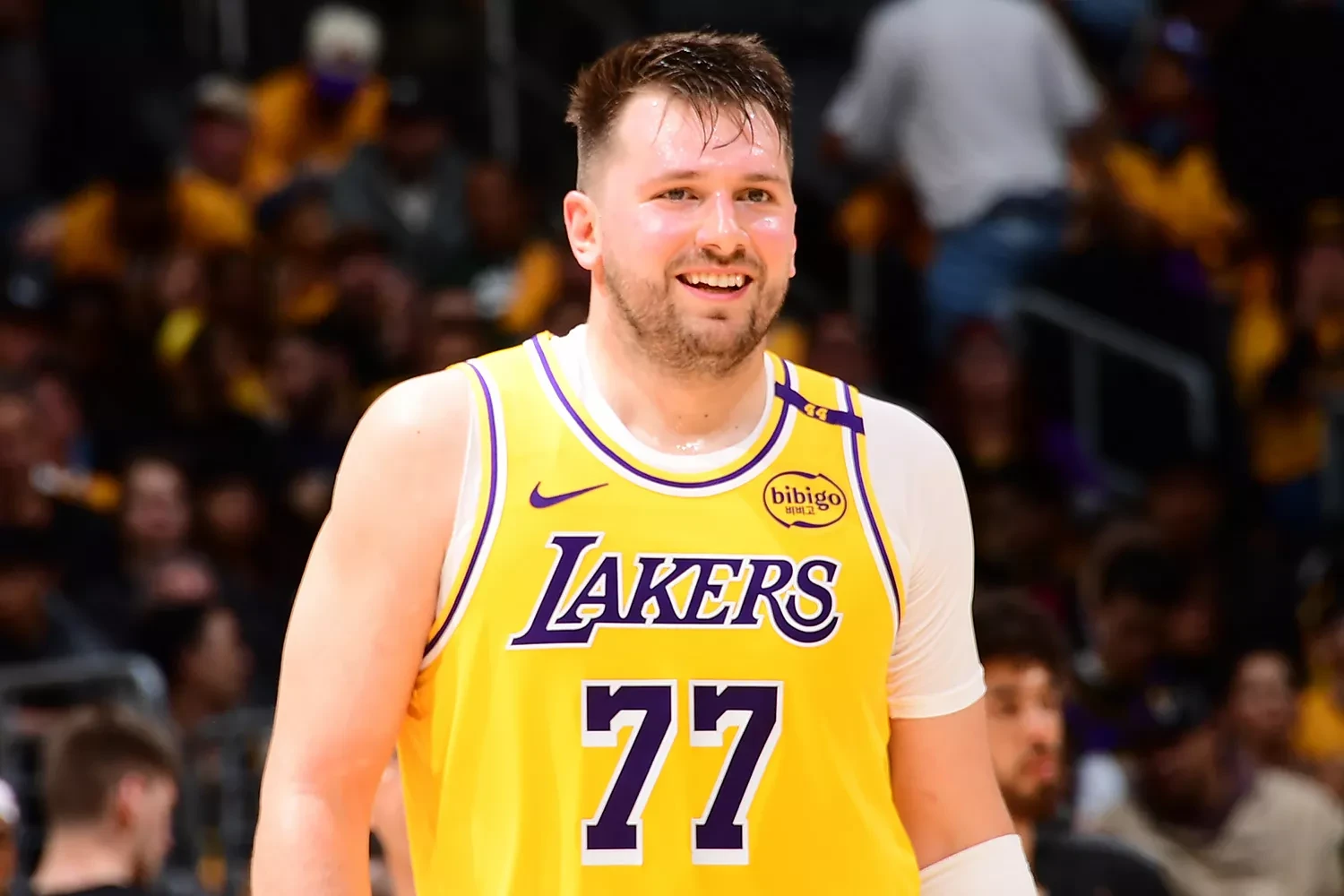 Luka Doncic #77 of the Los Angeles Lakers smiles during the game against the Utah Jazz on February 10, 2025 at Crypto.Com Arena in Los Angeles, California