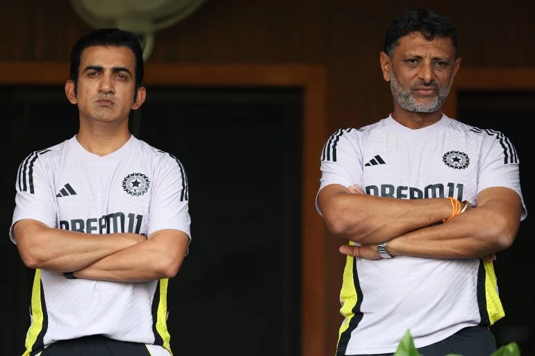 NAGPUR, INDIA - FEBRUARY 06: India Head Coach, Gautam Gambhir (L) alongside batting coach, Sitanshu Kotak (R) during the 1st ODI match between India and England at Vidarbha Cricket Association Ground on February 06, 2025 in Nagpur, India. (Photo by Michael Steele/Getty Images)