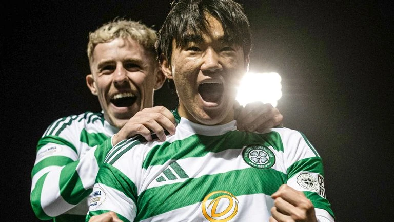 Celtic's Hyun-jun Yang celebrates with Luke McCowan as he scores to make it 3-2