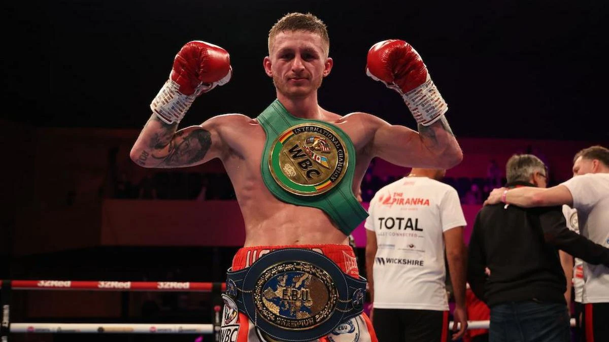 Ryan Garner poses with his new EBU European title after victory.