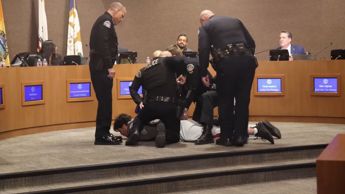 Chris Kluwe is shown being arrested at Tuesday night's Huntington Beach City Council meeting.