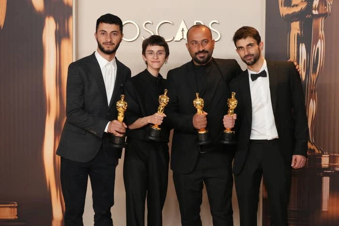 Basel Adra, Rachel Szor, Hamdan Ballal, Yuval Abraham, winners of the Best Documentary Feature Film for No Other Land