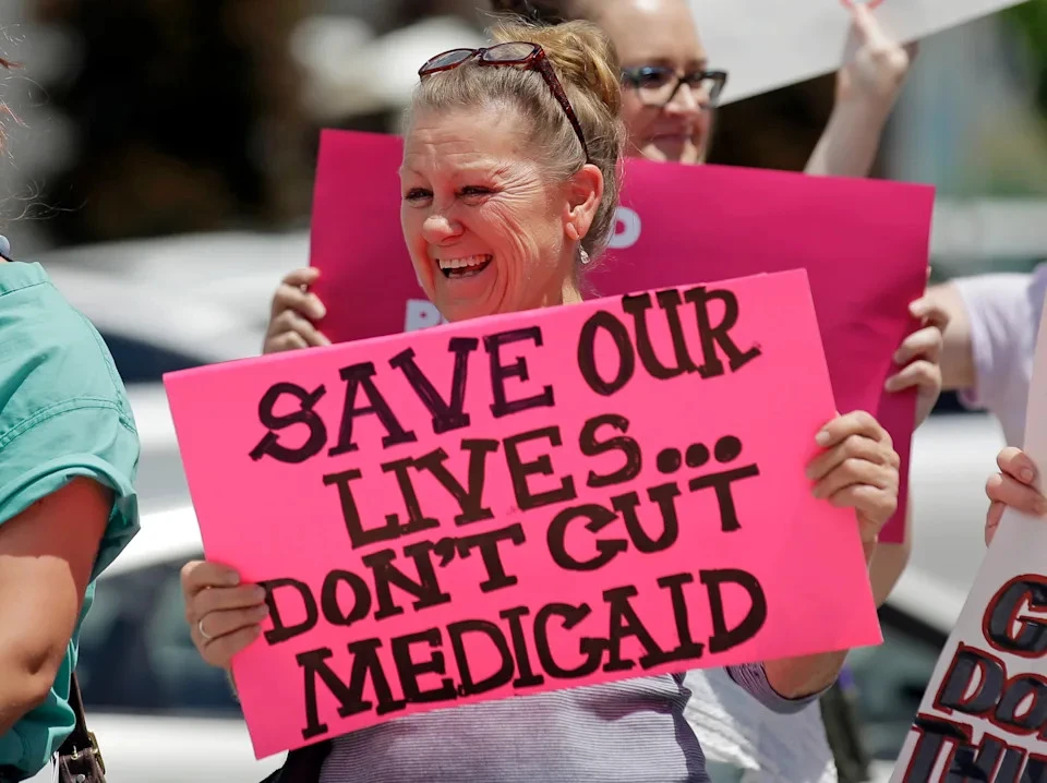 Protesters block a street during a demonstration against the Republican bill in the US Senate to replace former President Barack Obama's healthcare law, in Salt Lake City, highlighting the importance of Medicaid and other healthcare programs, (AP Photo/Rick Bowmer, File)  · ASSOCIATED PRESS