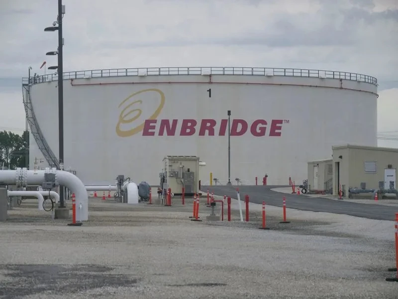 "Storage tanks at Enbridge's terminal, a critical hub in the US-Canada oil trade, stand as a testament to the complex energy landscape between the two nations. (Photo credit: Reuters)"