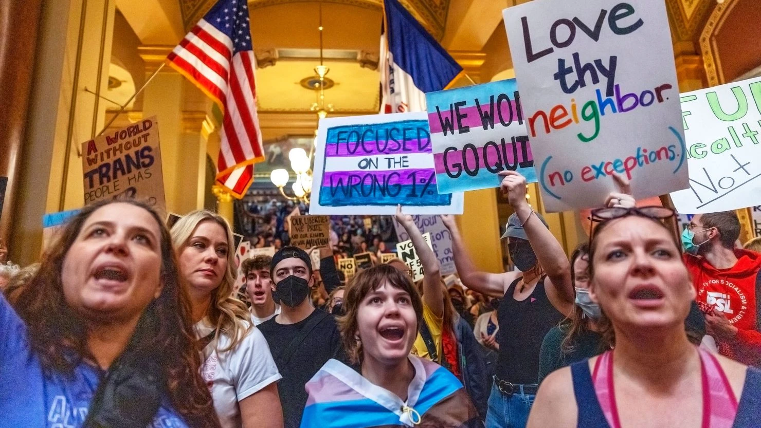 Protesters gather to protest a bill that strips the state civil rights protections based on gender identity, at the Iowa state Capitol in Des Moines, Iowa, on Thursday.