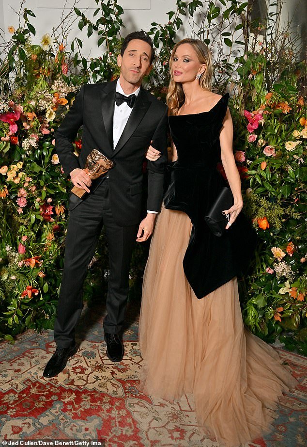 The couple were joined by Adrien Brody and girlfriend Georgina Chapman, who struck a pose with his Best Actor award following the glittering ceremony earlier in the evening