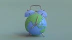 Earth globe that looks like an alarm clock on green background. Minimal idea concept.