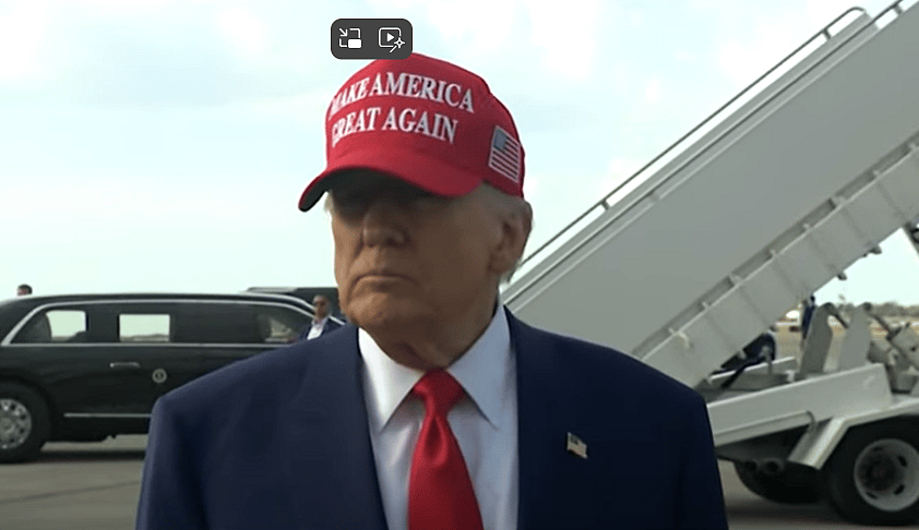 President Donald Trump listens to a question from a reporter on the tarmac of the airport in West Palm Beach, Florida on Saturday, February 16, 2025.  Screenshot.