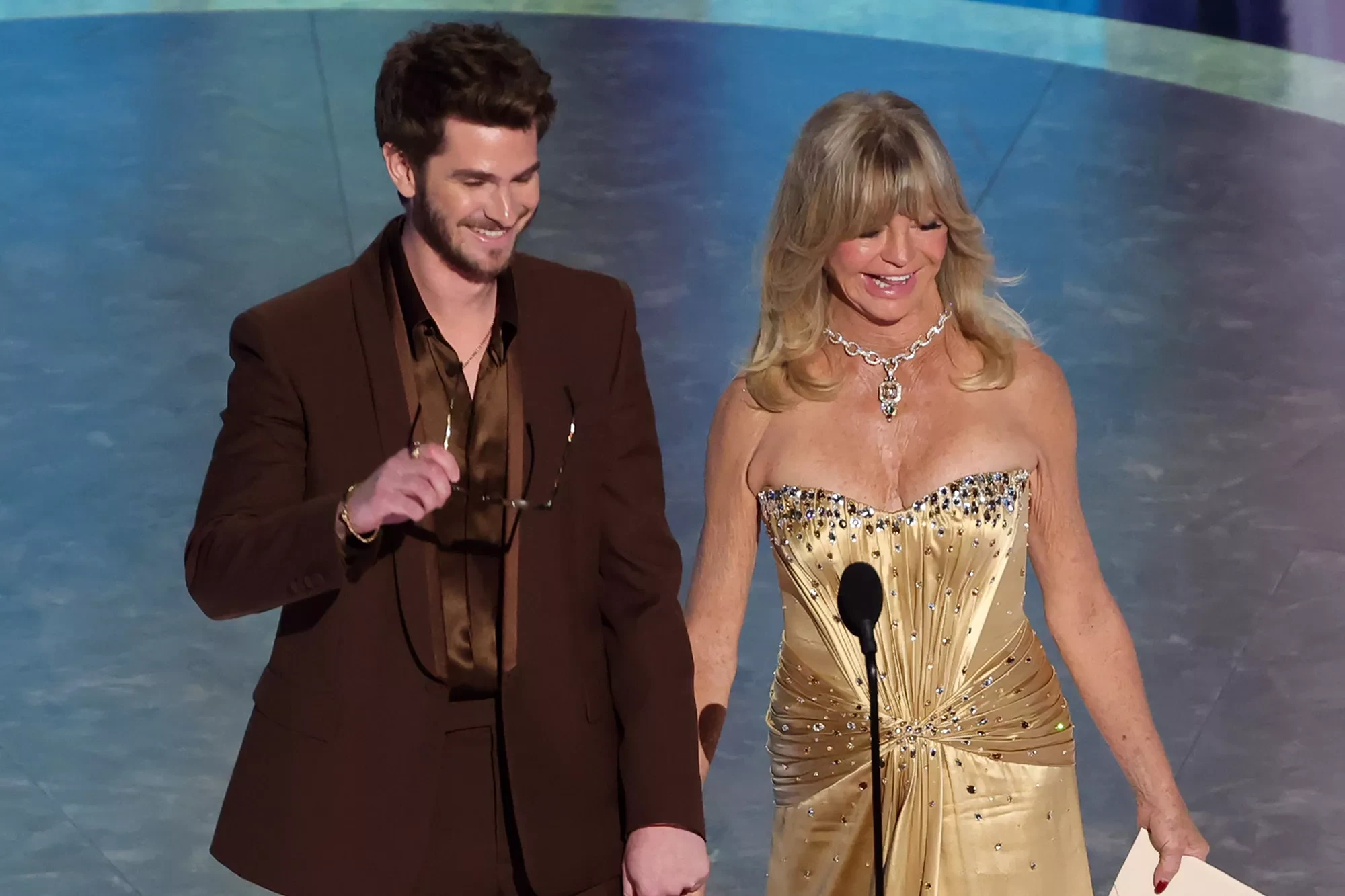 Andrew Garfield and Goldie Hawn speak onstage during the 97th Annual Oscars at Dolby Theatre on March 02, 2025 in Hollywood, California