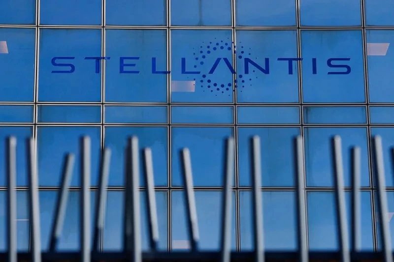 The Stellantis logo is prominently displayed on the company's building in Poissy, as captured by Reuters