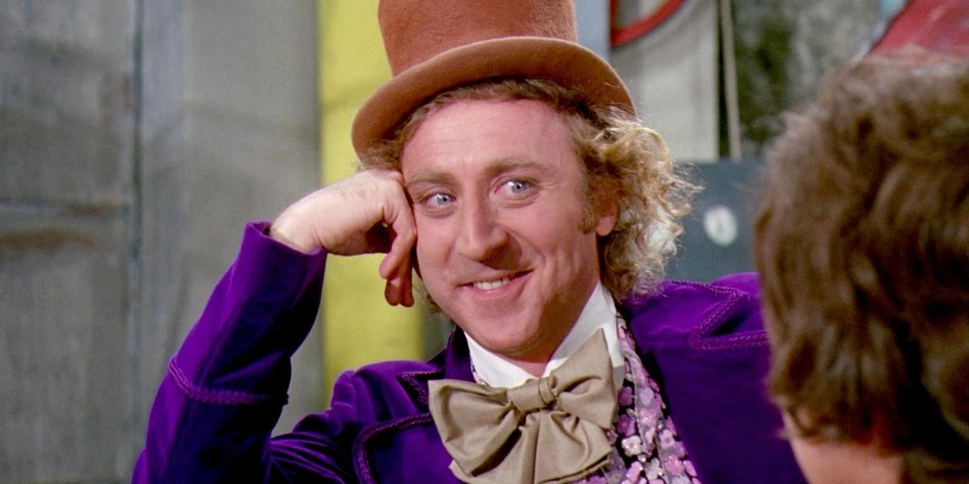 Gene Wilder as Willy Wonka smiles in Willy Wonka and the Chocolate Factory.