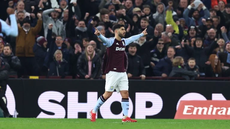 Aston Villa's Marco Asensio celebrates after scoring his side's second goal during the English FA Cup fifth round soccer match between Aston Villa and Cardiff City at the Villa Park stadium in Birmingham, England, Friday, Feb. 28, 2025. (Darren Staples/AP)