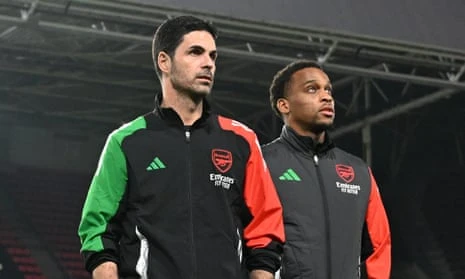 Arsenal manager Mikel Arteta and Jurriën Timber take a stroll around the PSV Eindhoven stadium on the eve of Arsenal’s game there.