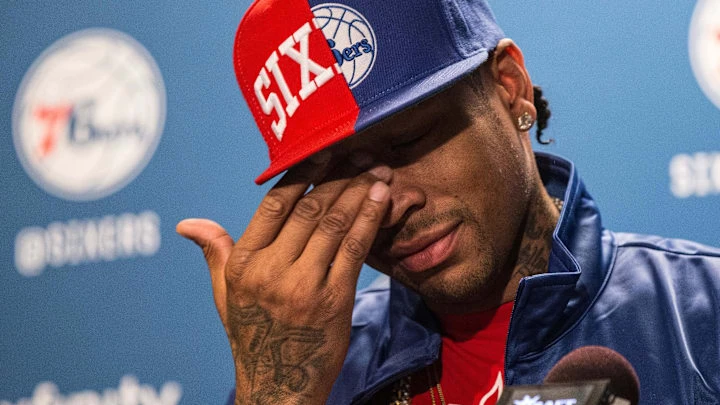 Apr 8, 2016; Philadelphia, PA, USA; Philadelphia 76ers legend Allen Iverson wipes tears away as he talks about his selection for enshrinement in the Naismith Memorial Basketball Hall of Fame as a member of the Class of 2016 during a press conference at Wells Fargo Center.