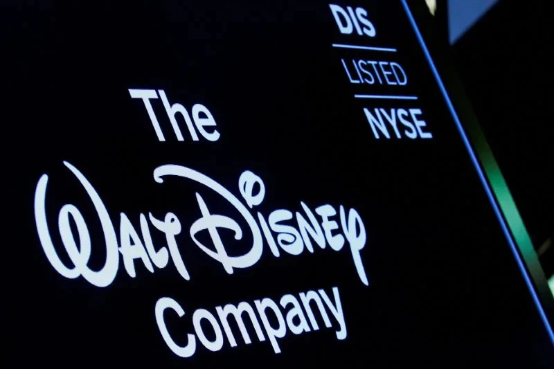 The Walt Disney Company logo on the New York Stock Exchange floor, symbolizing the media giant's ongoing transformation, as it navigates the shift to streaming and adapts to changing consumer habits, (Reuters/Brendan McDermid/File Photo) · Reuters / Reuters