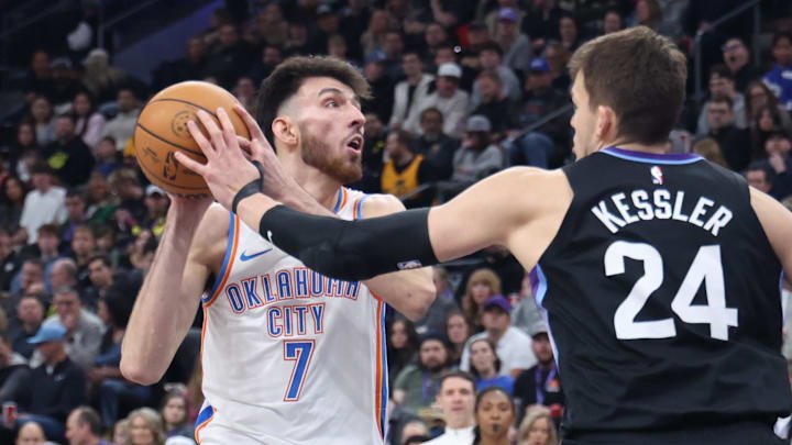 Feb 21, 2025; Salt Lake City, Utah, USA; Oklahoma City Thunder forward Chet Holmgren (7) goes to the basket against Utah Jazz center Walker Kessler (24) during the second quarter at Delta Center.