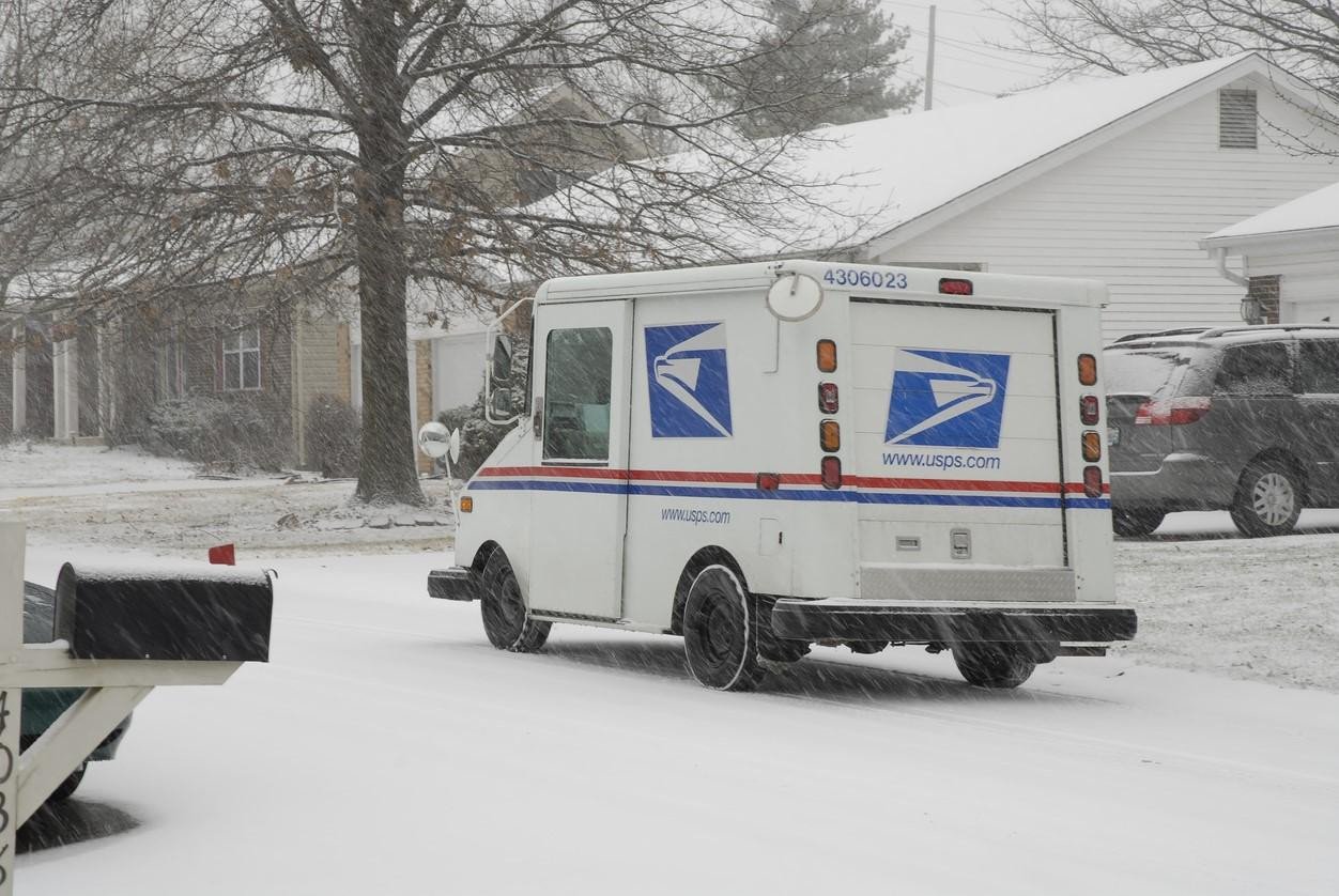 mail truck in snow