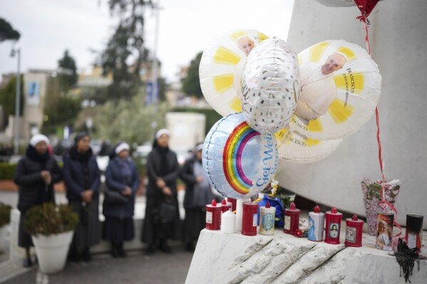 Nuns pray at the Agostino Gemelli Polyclinic, in Rome, Monday, Feb. 24, 2025 where Pope Francis is hospitalized since Friday, Feb. 14.