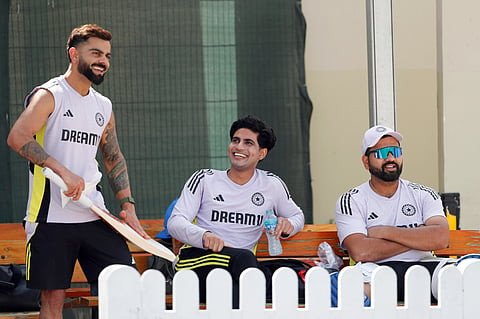 From left: India's Virat Kohli, Shubman Gill and Rohit Sharma having a lighter moment on the eve of the Champions Trophy match against Pakistan in Dubai on Saturday.