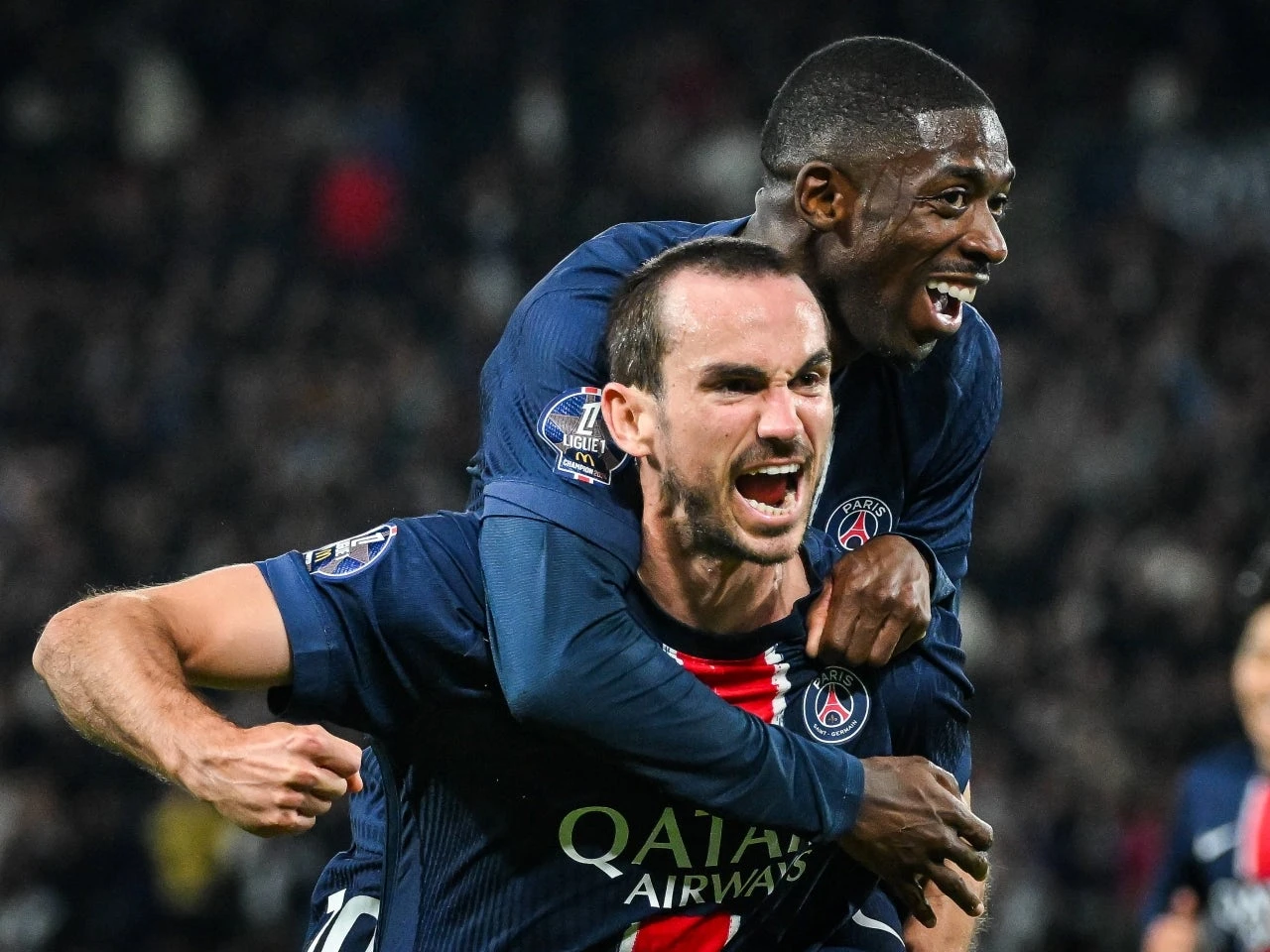 Paris Saint-Germain's Fabian Ruiz celebrate his goal with Ousmane Dembele on September 14, 2024