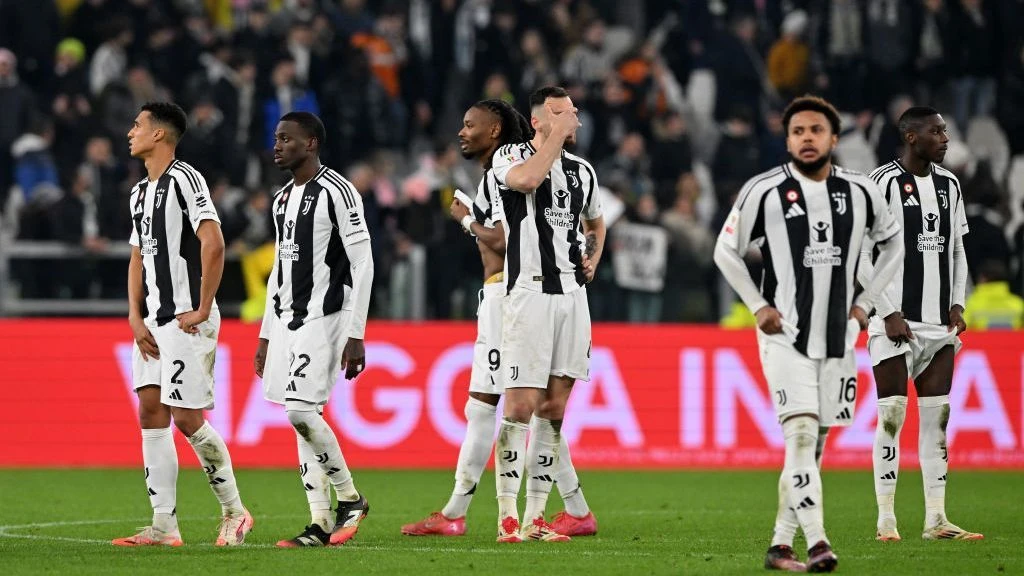 Juventus players react after losing a shootout to Empoli in the Coppa Italia.