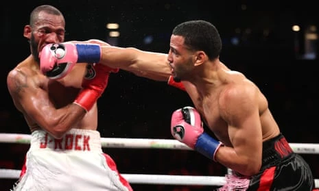 Yoenis Tellez lands a right hand on Julian Williams during their junior middleweight bout at Barclays Center on the Gervonta Davis-Lamont Roach Jr undercard.