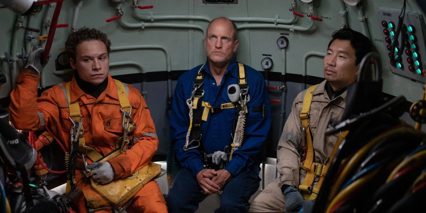 Finn Cole, Woody Harrelson, and Simu Liu in a submersible pod in Last Breath.