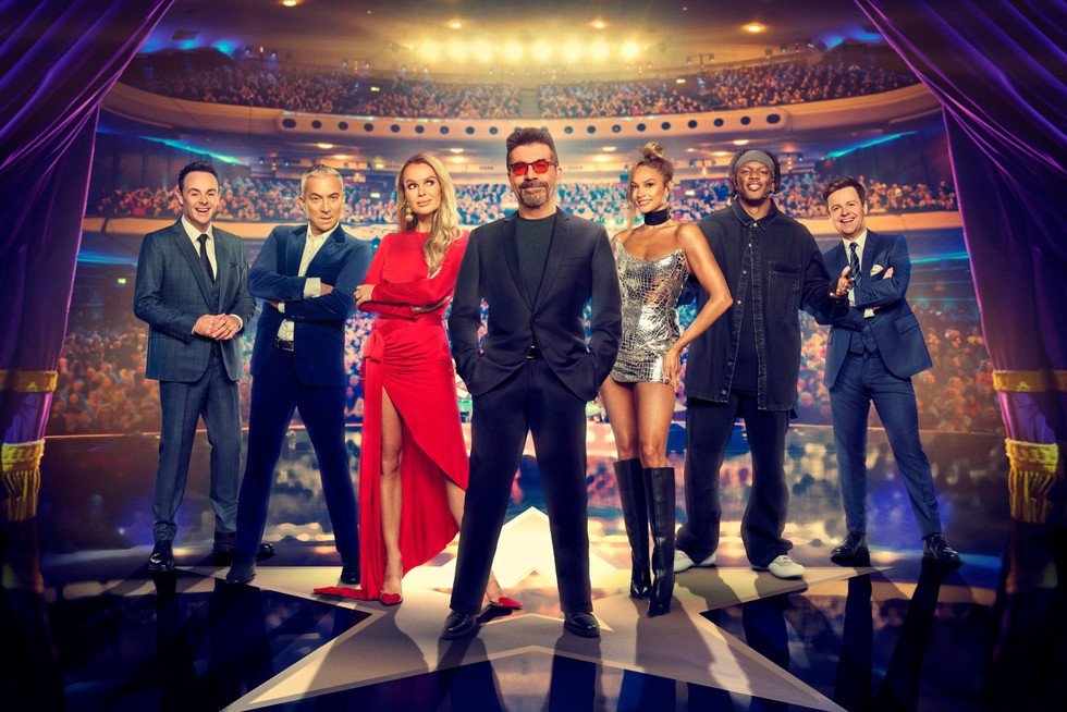 Ant & Dec, Alesha Dixon, Amanda Holden, Simon Cowell, Bruno Tonioli and KSI for Britain's Got Talent, stood on a stage